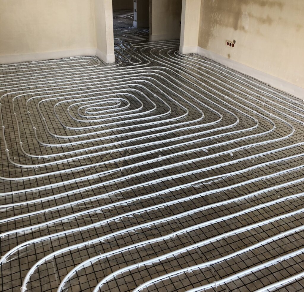 Ogrzewanie podłogowe Rajsko montaż INVESTWORK